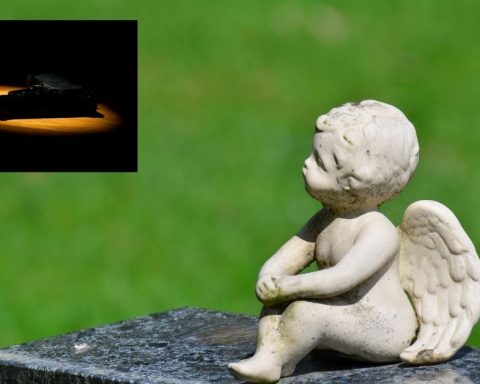 Child Angel views gun in spotlight