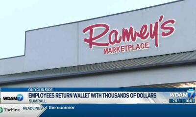 Employees return wallet with thousands of dollars
