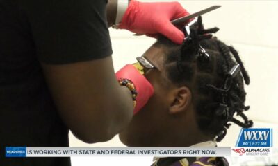 Movers and Shakers Social Club offered free back-to-school haircuts