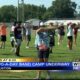Houston High students prepare under hot sun for the upcoming marching band season