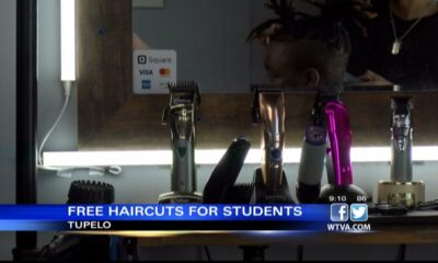 VIDEO: Local barbershop donates free haircuts to children for back to school