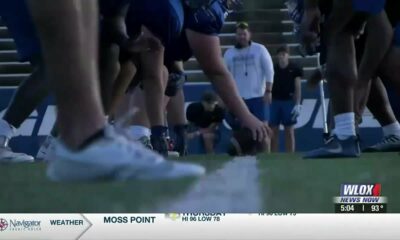 Ocean Springs High football team practices early to beat the heat