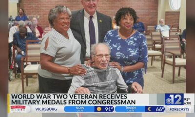 World War II veteran receives military medals from Congressman