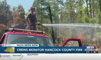 Crews still monitoring Hancock County woods fire