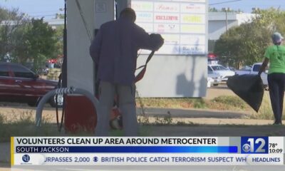 Volunteers cleanup area around Metrocenter Mall