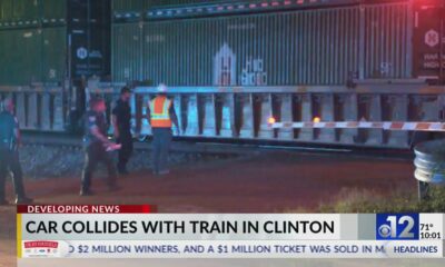 Two injured after car collides with train in Clinton