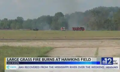 Large grass fire burns at Hawkins Field