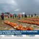 Volunteers unload 5,000 pumpkins for Trinity Episcopal Pumpkin Patch