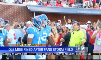 Ole Miss fined after fans stormed field