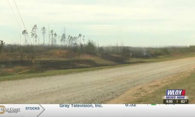 Jackson County woods fire taking over 7 acres
