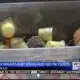 Junior Auxiliary in Tupelo packs food for students