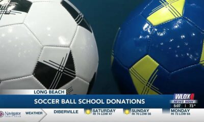 Coast Trash Football Club donates soccer balls to district
