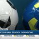 Coast Trash Football Club donates soccer balls to district