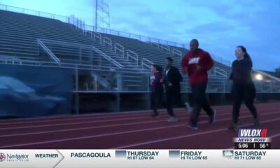 Runners meet at Greyhound Stadium to prep for upcoming Gulf Coast Marathon