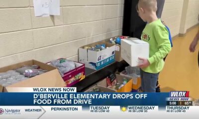 D'iberville Elementary School drops off food from canned food drive