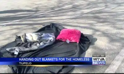 Local group hands out warm weather gear to homeless