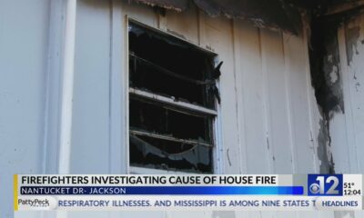 Firefighters investigate early morning house fire