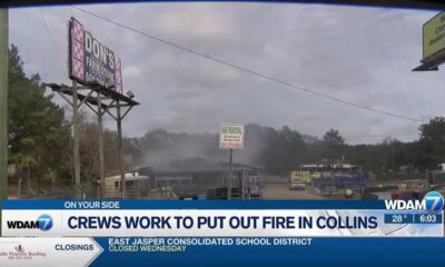 Crews work to put out fire in Collins