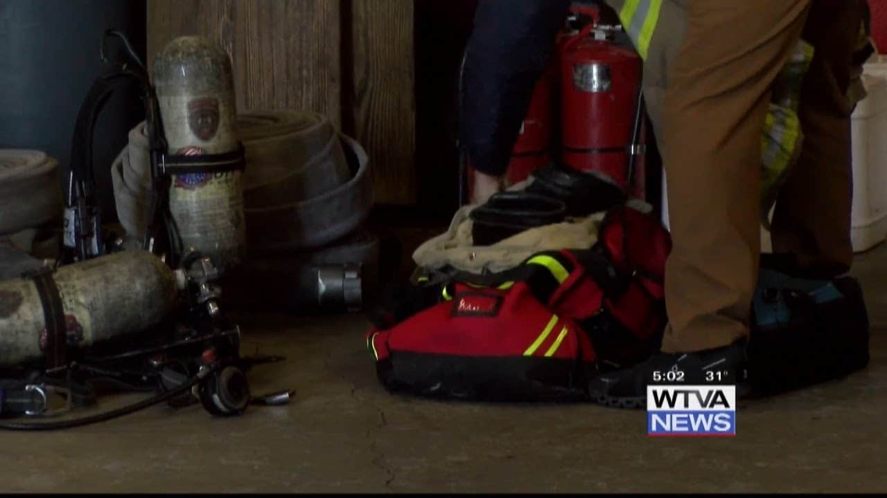 Firefighter reacts to extreme cold weather after fire fight