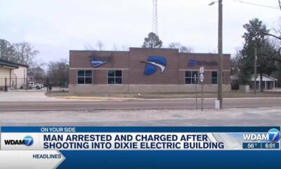 Man arrested and charged after shooting into Dixie Electric building