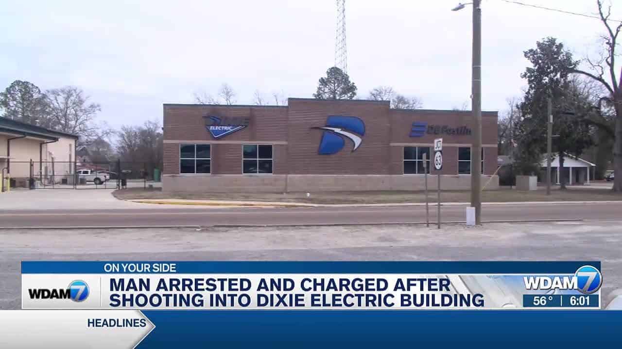 Man arrested and charged after shooting into Dixie Electric building