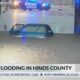 Vehicle submerged due to flooding in Jackson