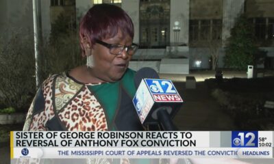 Sister of George Robinson reacts after court reverses conviction of Anthony Fox