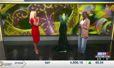 Fashion designers showing off Mardi Gras gowns