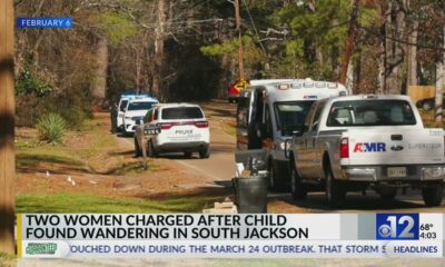 Two women charged after child found wandering in South Jackson