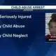 Woman charged after 1-year-old seriously injured
