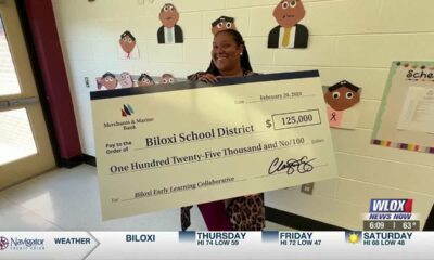 Merchants & Marine Bank grants 5,000 check to Biloxi School District’s early learning program