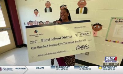 Merchants & Marine Bank grants $125,000 check to Biloxi School District’s early learning program