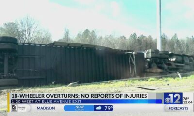 18-wheeler overturns on I-20 in Jackson