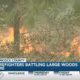 419 acres burned as firefighters continue battling large woods fire in Hancock County