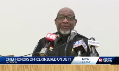 JPD officer honored after being hit by vehicle