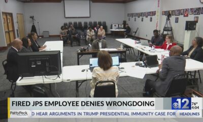 Fired JPS employee denies wrongdoing
