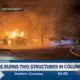 Fire burns two structures in Columbia