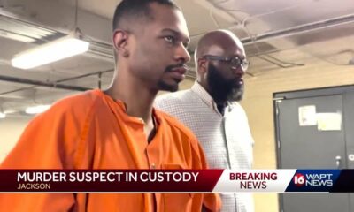 Murder suspect brought back to Jackson