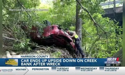Car ends up on creek bank after Harrison Co. wreck