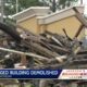 Burned building being torn down on Highway 18