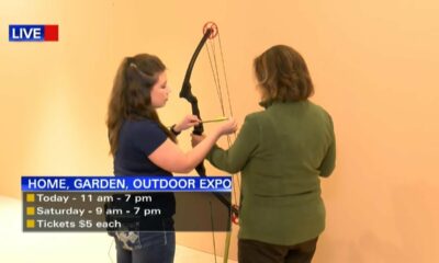Chelsea Simmons and Tanya Carter show off their archery skills