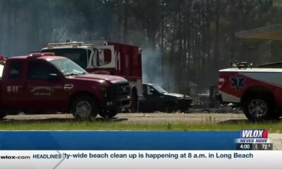 Hwy 49 lanes reopen following large fire at business; heavy smoke still present