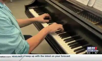 Gulfport High School Choir students call for donations for new piano
