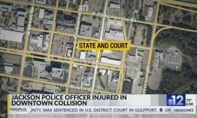 Jackson police officer, driver injured in crash