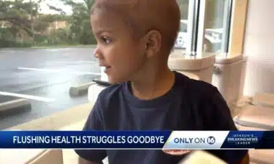 A young cancer patient is happy to flush toilets all day