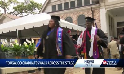 Tougaloo graduates walk across the stage