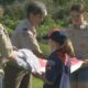 Area Boy Scout troops raise new American flag at Magnolia Cemetery
