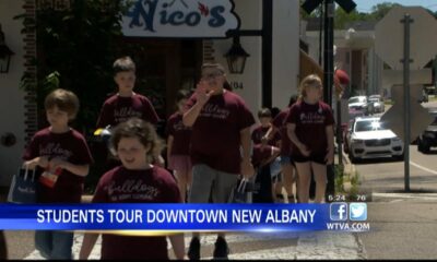 Students in New Albany take a tour of the city