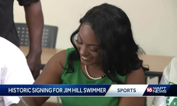 Jim Hill swimmer makes history with signing