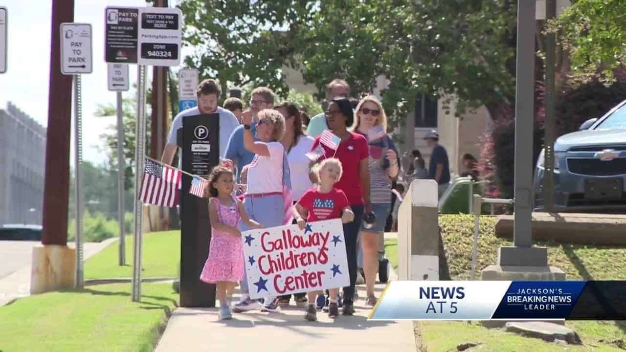 Kids take part in Fourth of July Parade